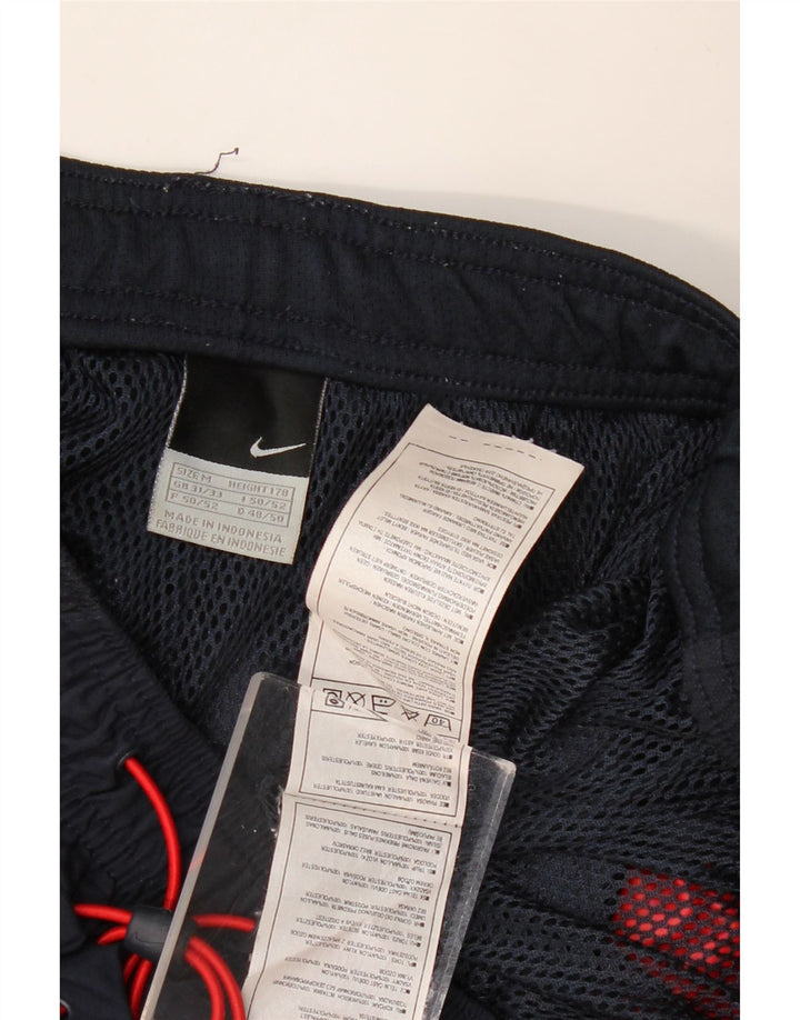 NIKE muške kapri trenirke srednje tamnoplave najlonske blokove boje