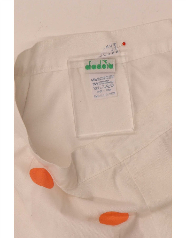 Diadora ženska mini suknja UK 12 srednje veličine W26 bijeli poliester na točkice
