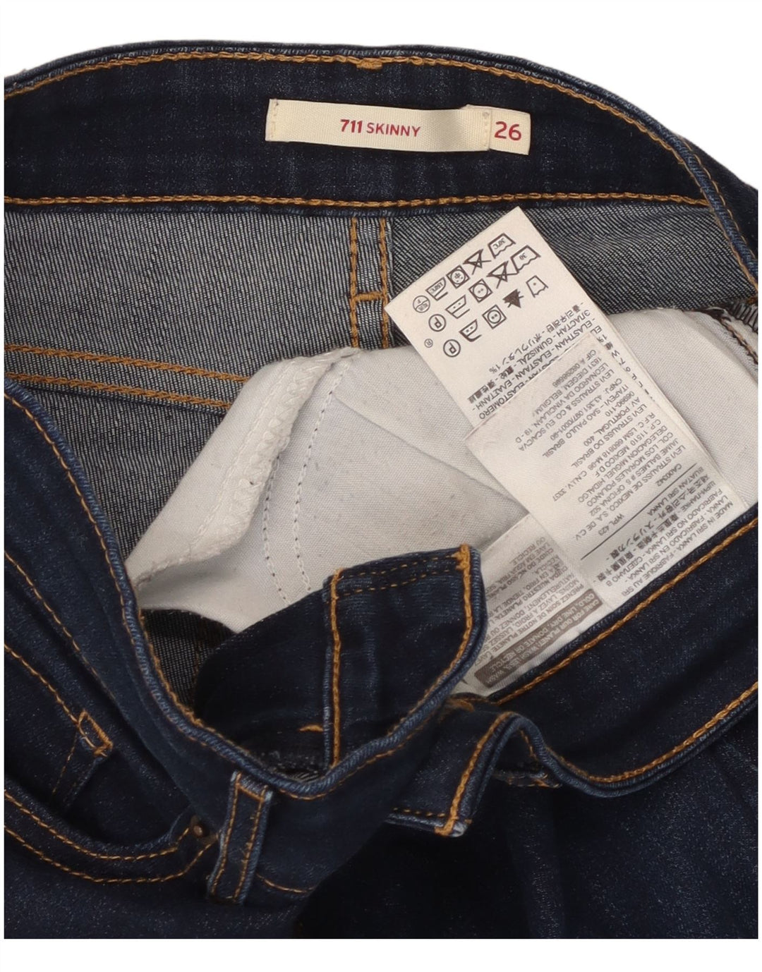 LEVI'S ženske 711 uske traperice W26 L27 tamnoplavi pamuk