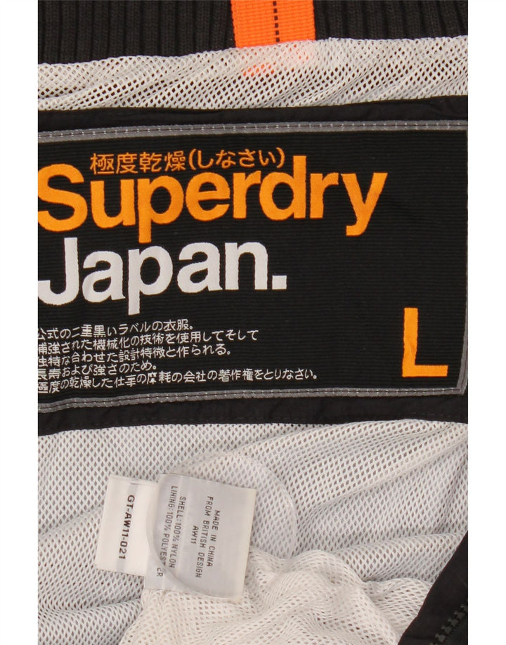 SUPERDRY ženska jakna vjetrovka UK 16 velika crna