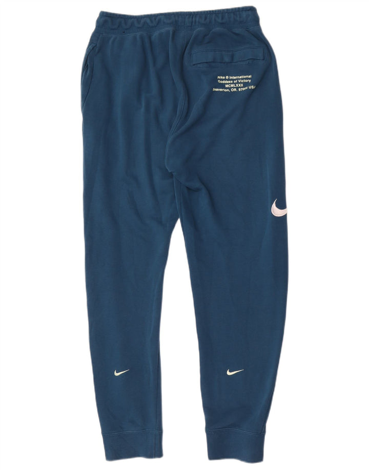 Nike muška trenirka s grafičkim detaljima, mala plava pamučna