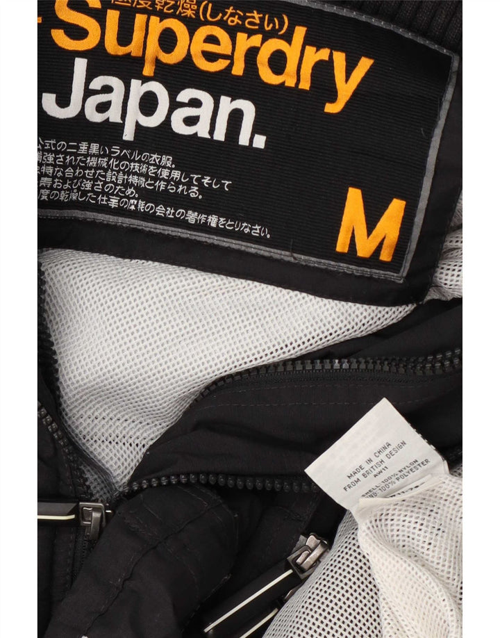 Superdry ženska kišna jakna UK 14 srednje crna