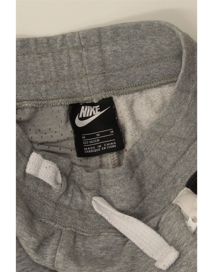 Nike Boys Trenirka Hlače Joggers 10-11 Years Medium Grey Colourblock