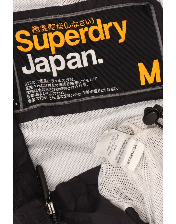 Superdry ženska kišna jakna s grafičkim motivima UK 14 Srednje crni najlon