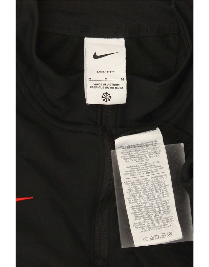 Nike Dri Fit majica s izrezom na patent i gornji dio trenirke srednje crne boje