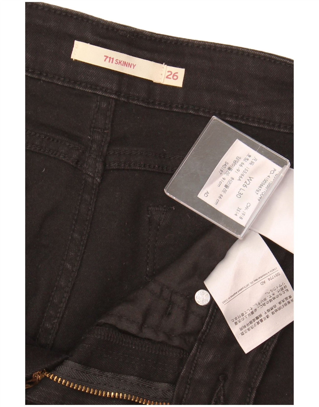 LEVI'S ženske 711 uske traperice W26 L30 crni pamuk
