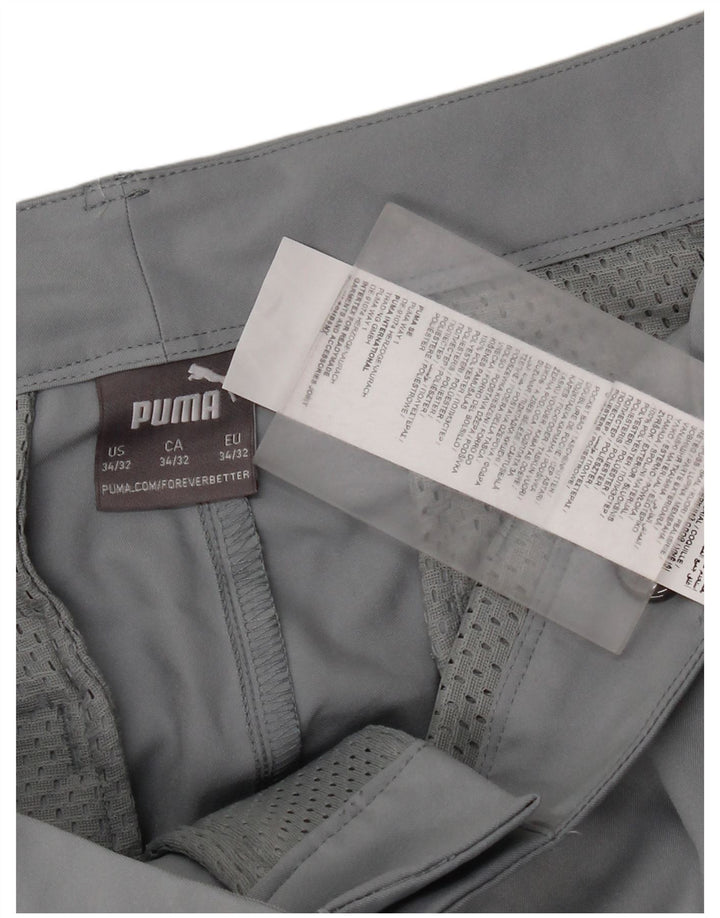 Puma muške uske chino hlače W34 L32 sivi poliester