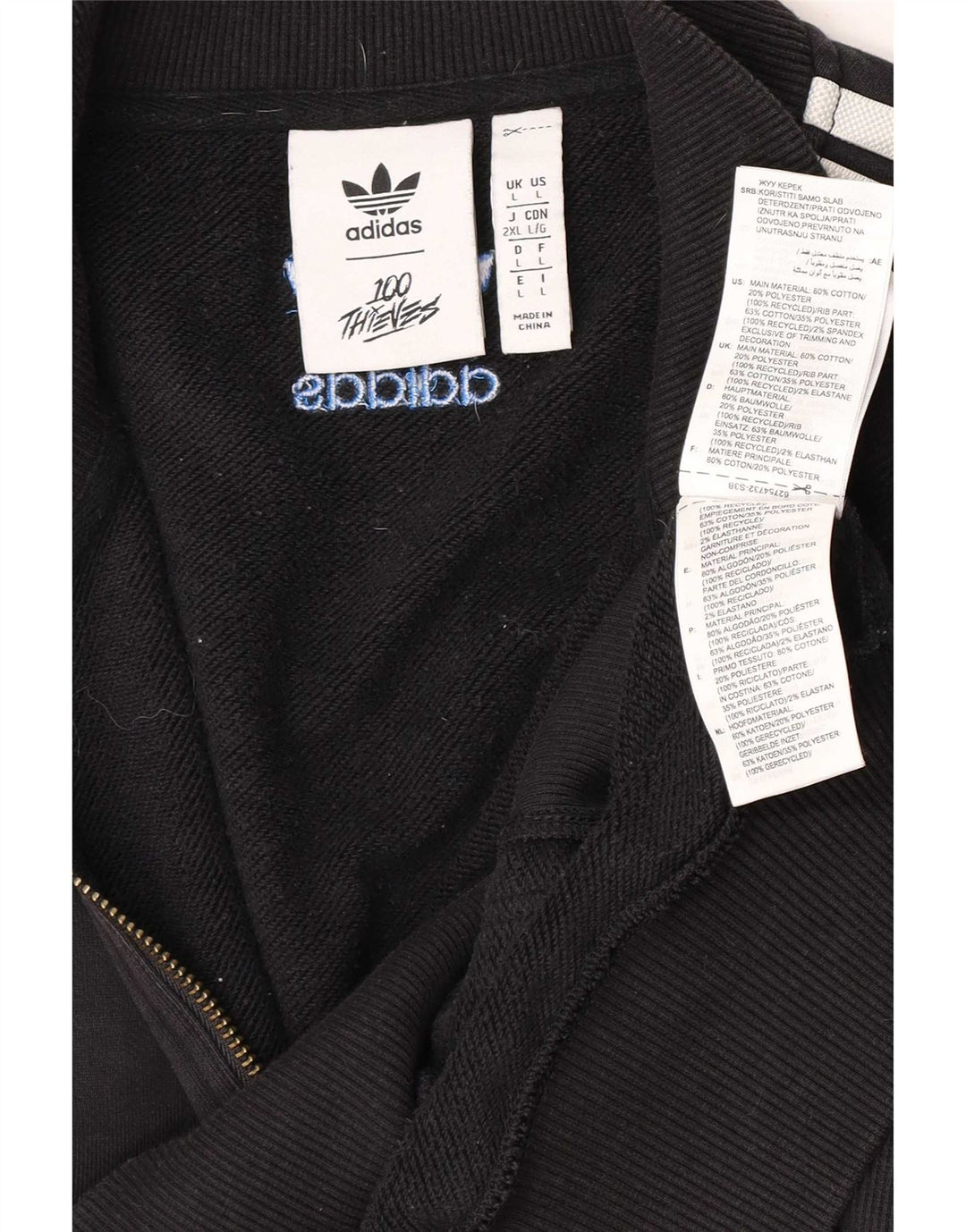 Adidas muška majica s izrezom i velikim crnim pamukom