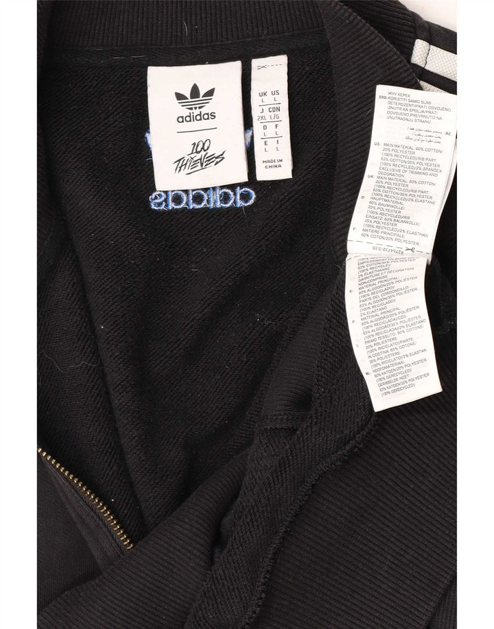 Adidas muška majica s izrezom i velikim crnim pamukom