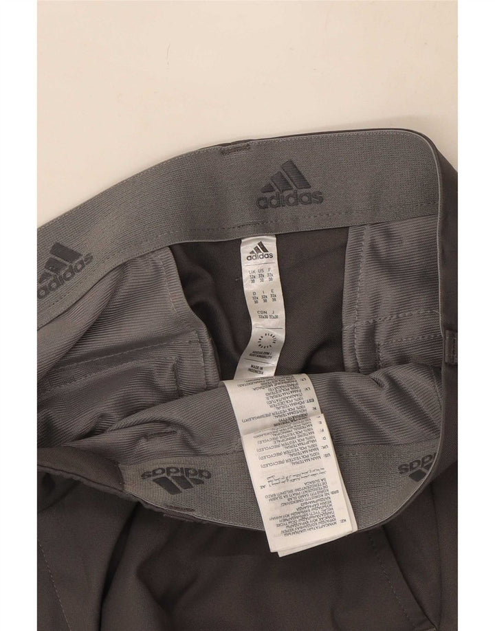 Adidas muške ravne chino hlače W32 L30 sivi poliester
