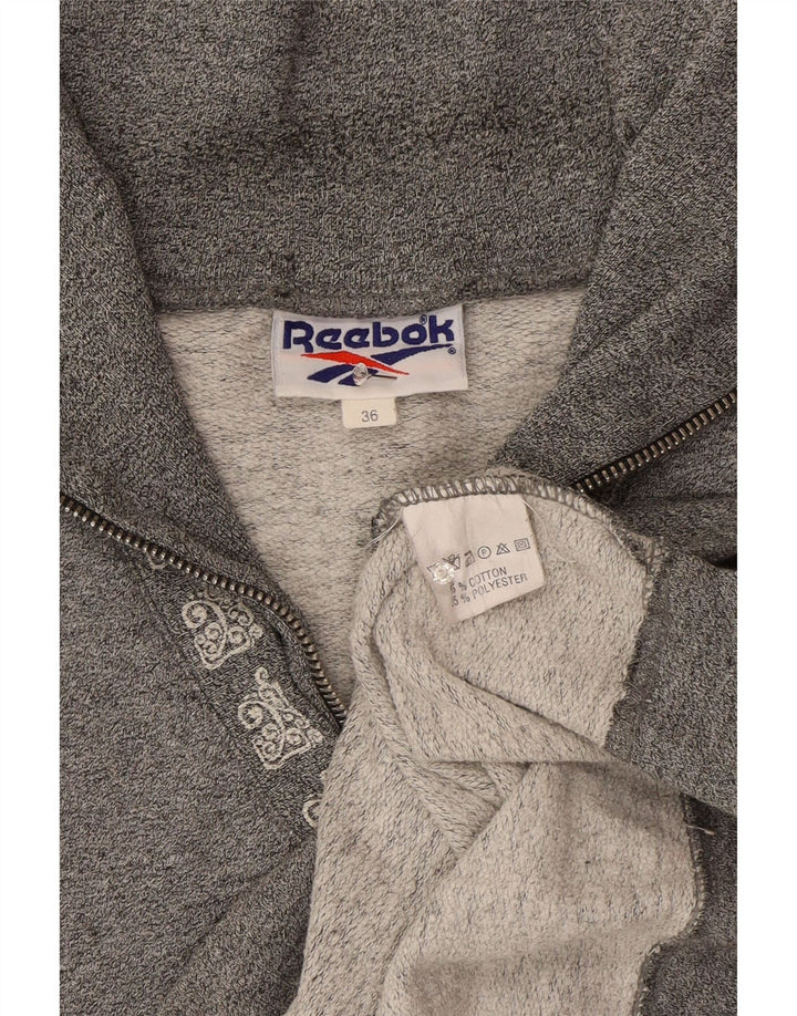Reebok ženska majica s kratkim izrezom s patentnim zatvaračem EU 36 mala siva pamuk