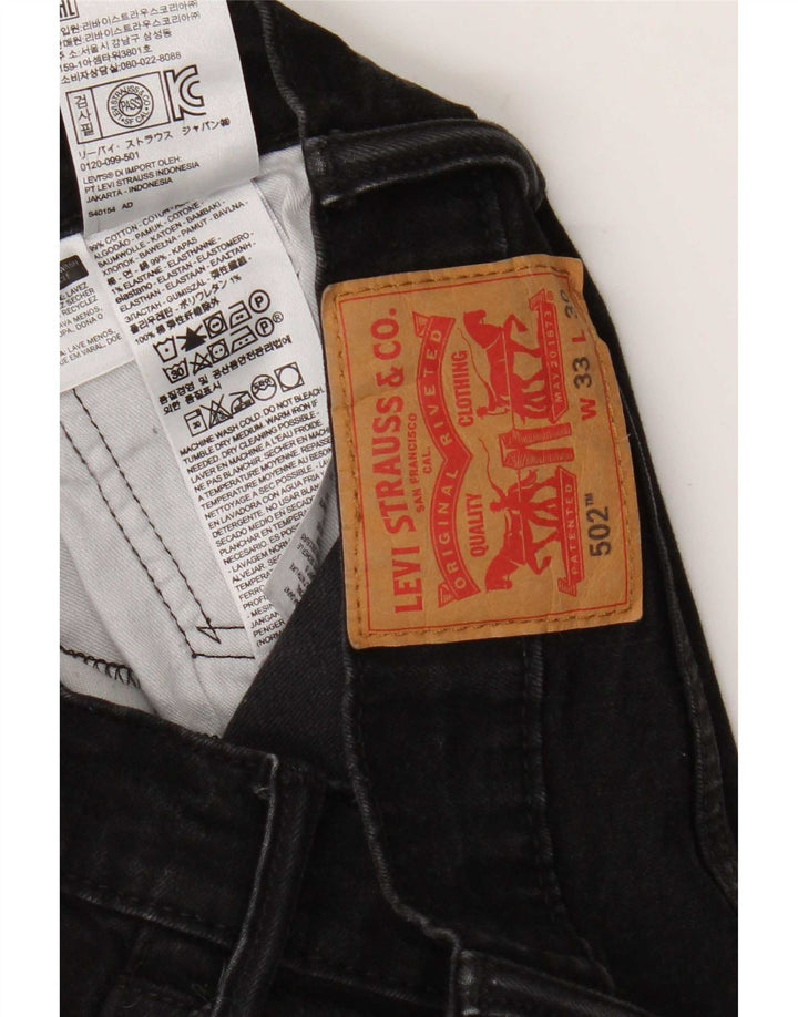 Levi's muške 502 ravne traperice W33 L27 crni pamuk