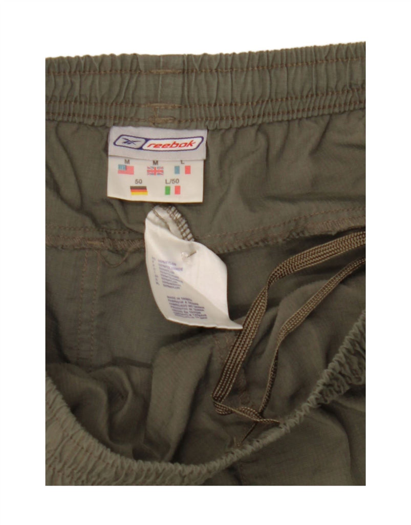 REEBOK Mens Capri Trousers Medium W32 L17 Khaki Nylon Vintage Reebok and Second-Hand Reebok from Messina Hembry 