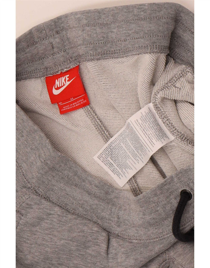 Nike muške grafičke trenirke, srednje sive pamučne hlače