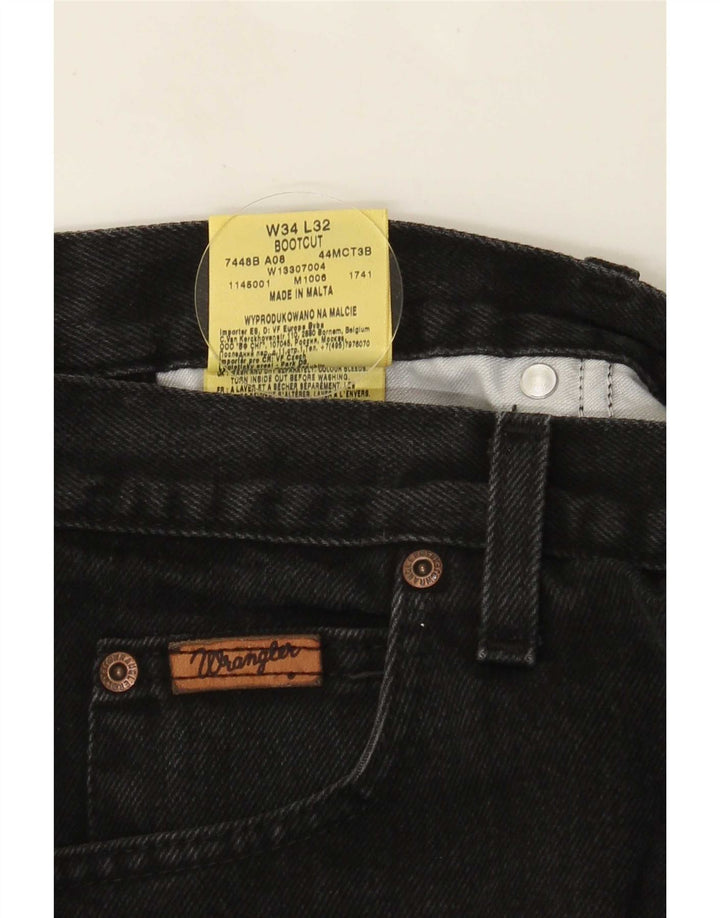 Muške traperice Wrangler Bootcut W34 L27 crni pamuk