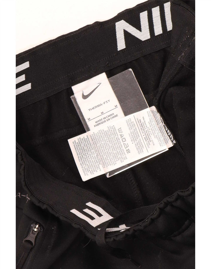 Nike muške trenirke Therma-Fit hlače za trčanje Srednji crni poliester