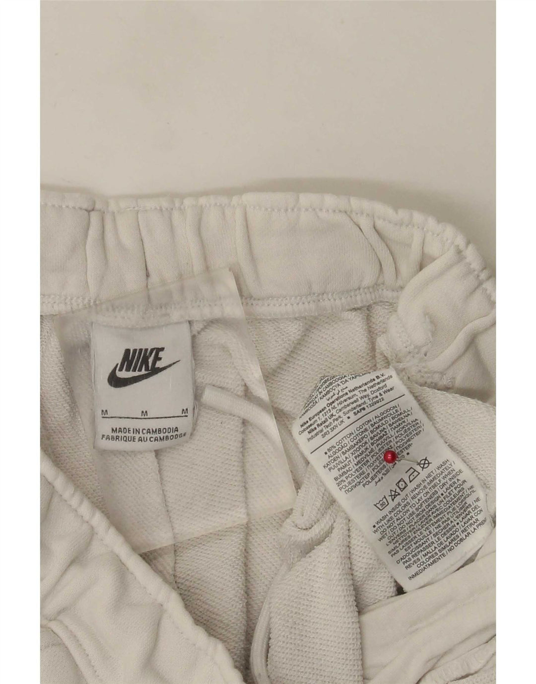 Nike muške grafičke trenirke, hlače za trčanje srednje bijele boje