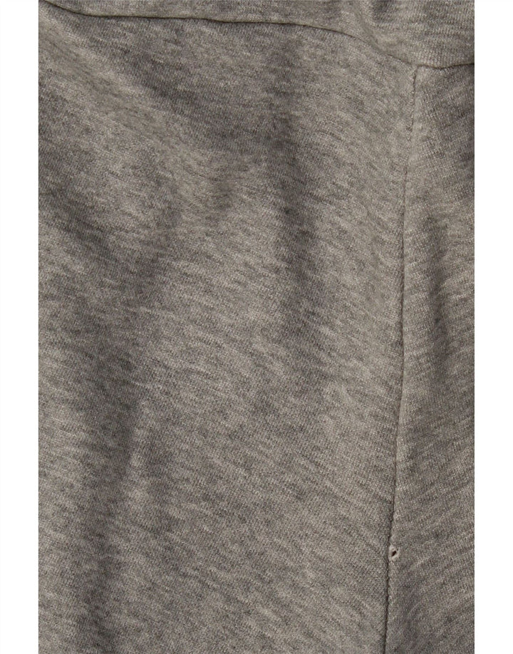 PUMA Ženska trenirka Hlače Joggers srednje sivi flekasti pamuk