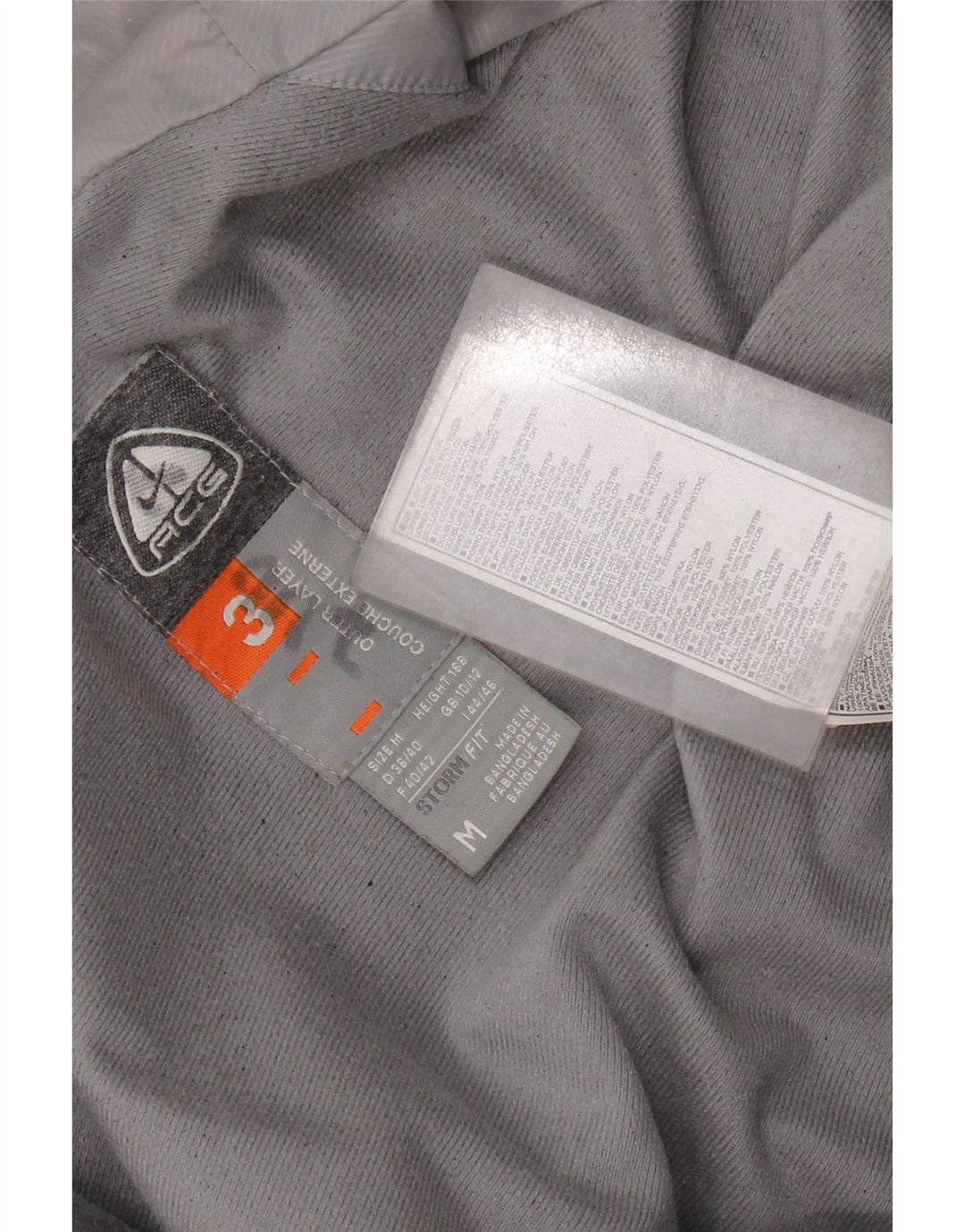 NIKE ženska jakna vjetrovka Storm-Fit UK 14 srednje crvene boje