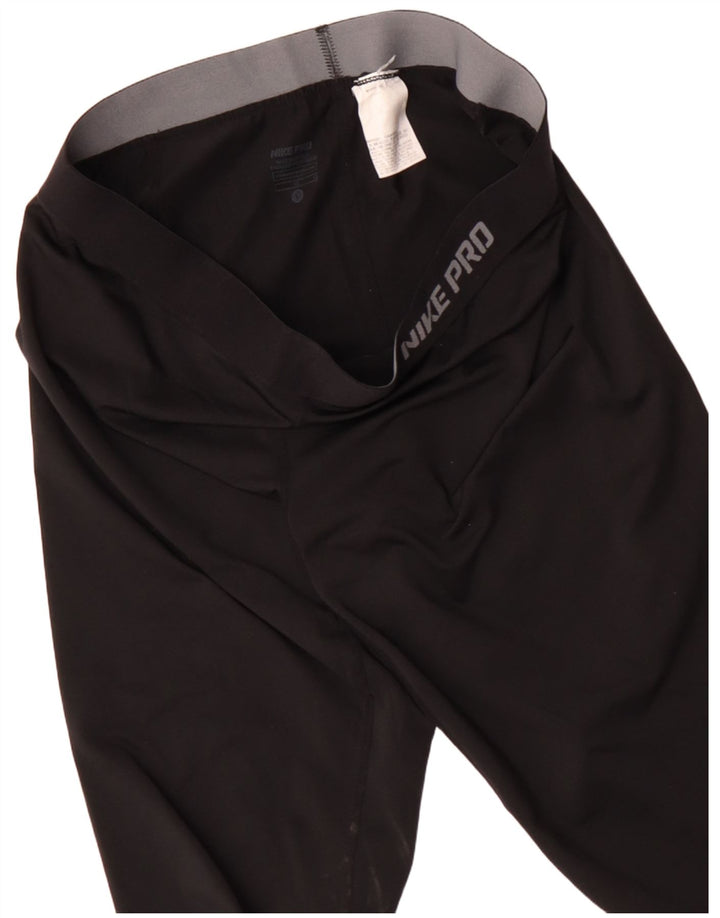 Nike ženske Graphic Capri tajice UK 26 velike crne poliesterske