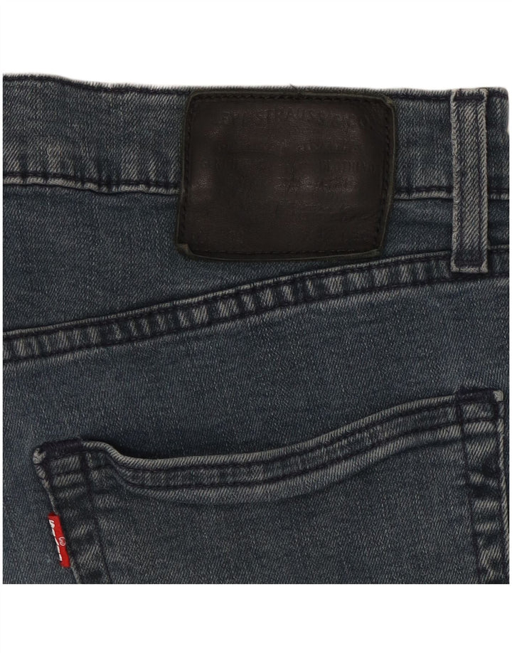 Levi's muške 502 sužene traperice W32 L30 tamnoplave