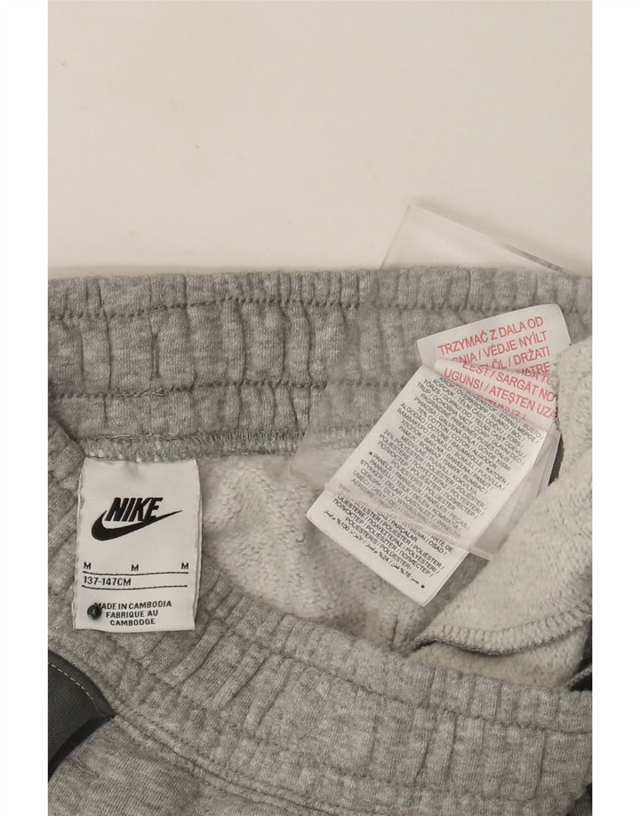Nike Boys Trenirka Hlače Joggers 10-11 Years Medium Grey Colourblock