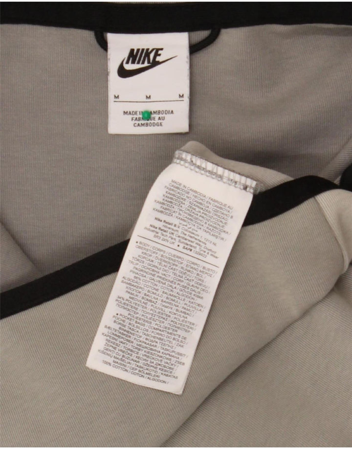 Nike muški pulover s kapuljačom na patentni zatvarač srednje sivi pamuk u blokovima boja