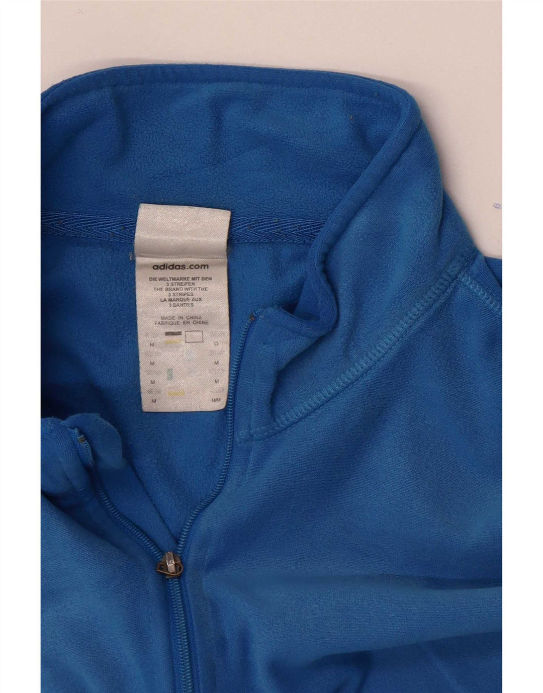 Adidas ženska majica širokog kroja s izrezom i dugim rukavima srednje plave boje od poliestera