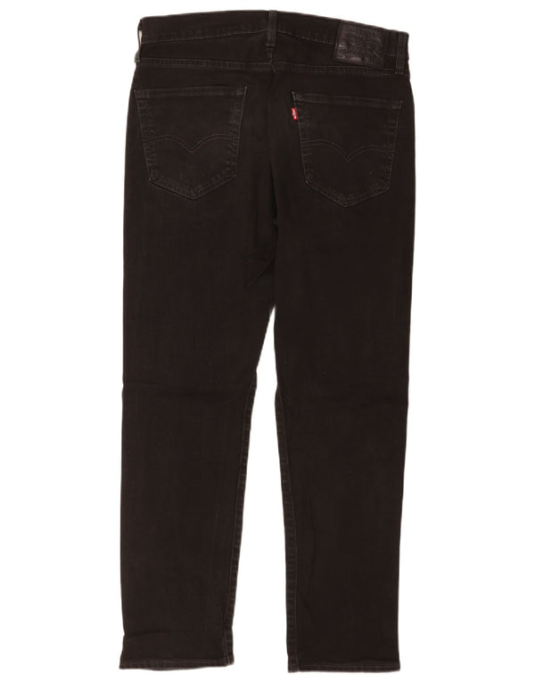 Levi's muške 502 sužene traperice W33 L30 crni pamuk