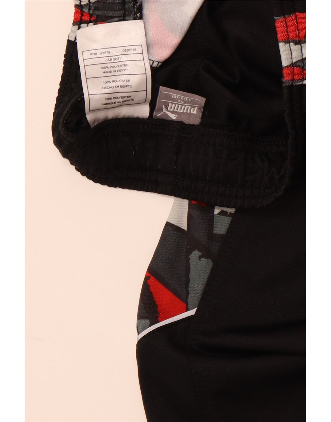 PUMA Trenirka Hlače Joggers 14-15 godina Large Black Geometric