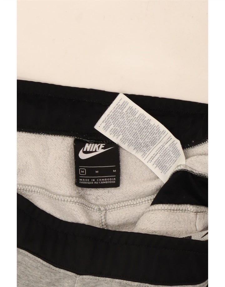 Nike muške trenirke Hlače Joggers srednje sive boje, pamuk