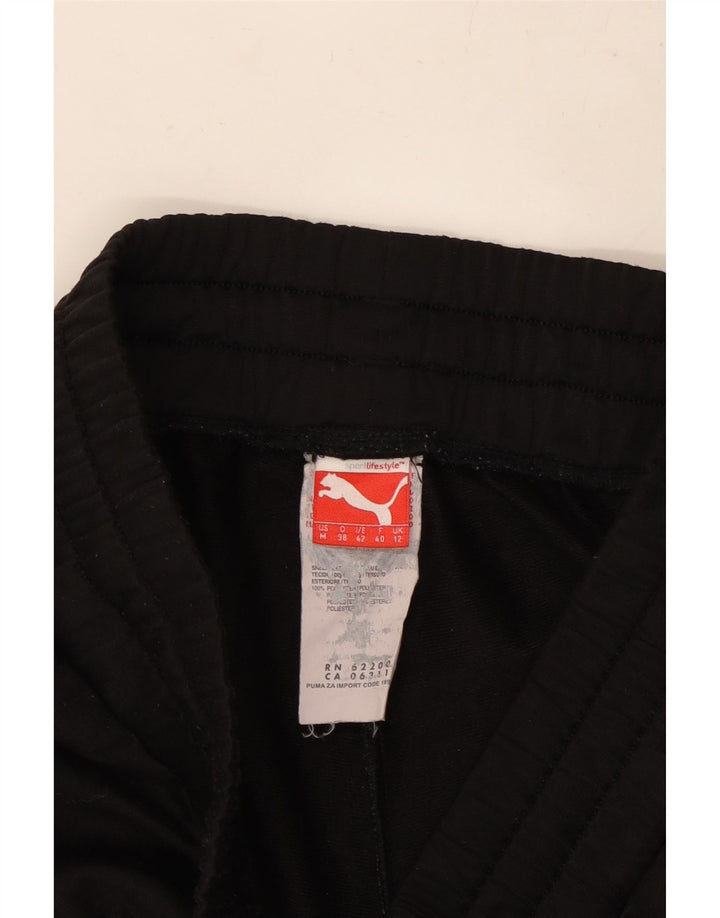 PUMA Ženska trenirka Hlače Joggers UK 12 Srednji crni poliester