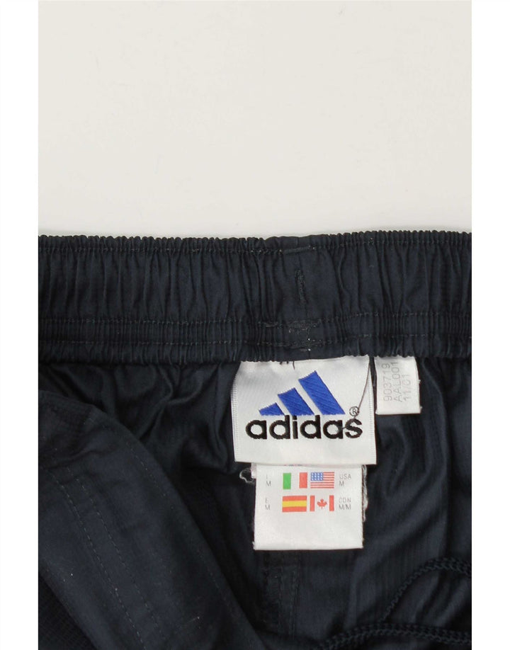 Adidas muške trenirke srednje tamnoplave poliesterske hlače