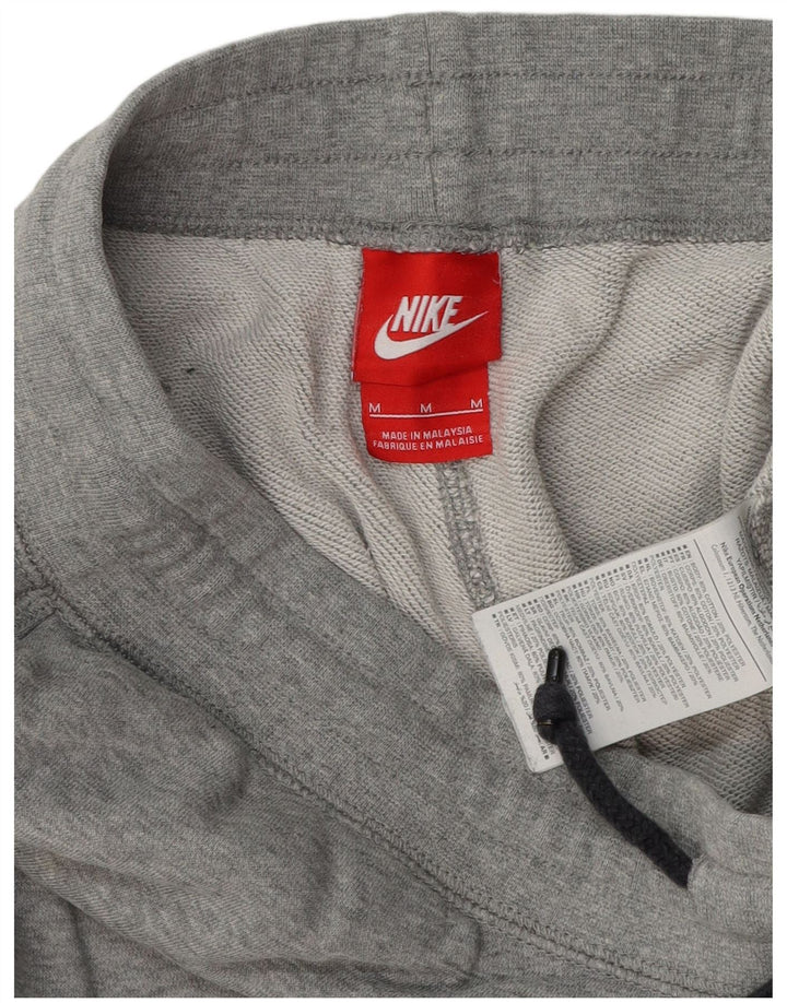 NIKE muške trenirke s grafičkim motivima, srednje sive pamučne hlače