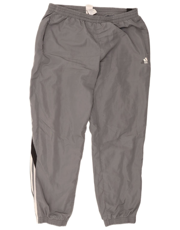 Adidas muške trenirke Hlače Joggers XL sivi poliester u boji