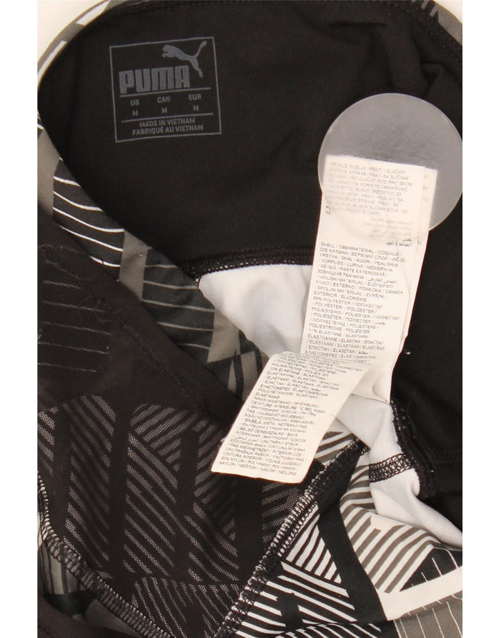 Puma ženske Capri tajice UK 12 Srednje crni geometrijski poliester