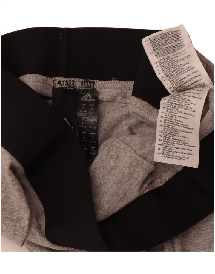 Adidas ženske grafičke tajice UK 12/14 srednje sive pamučne blokove