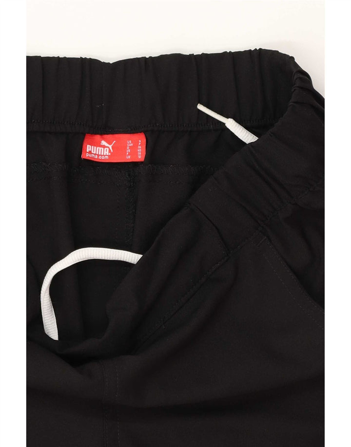 Puma ženske Capri trenirke UK 10 male crne