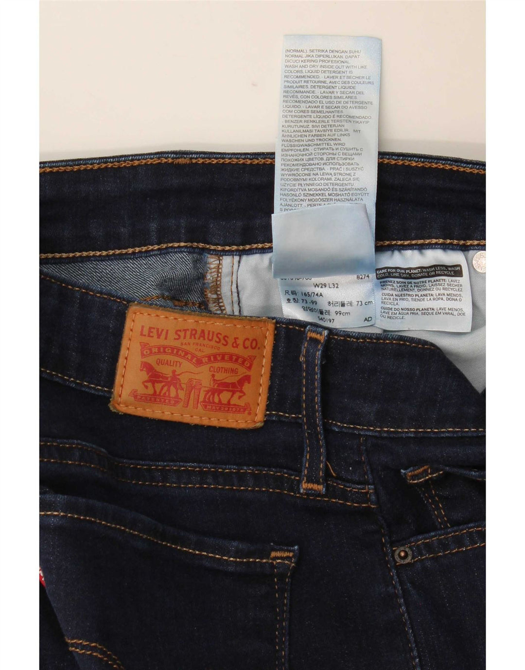 Levi's ženske 712 uske traperice W29 L32 tamnoplavi pamuk