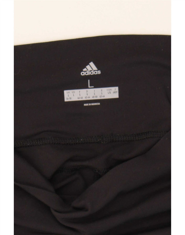 Adidas ženske tajice UK 16/18 velike crne