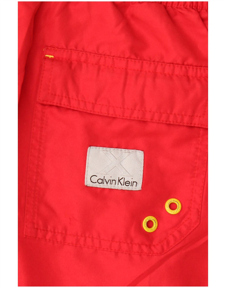 CALVIN KLEIN Muške kratke hlače za plivanje Espana Graphic Medium Red Colourblock