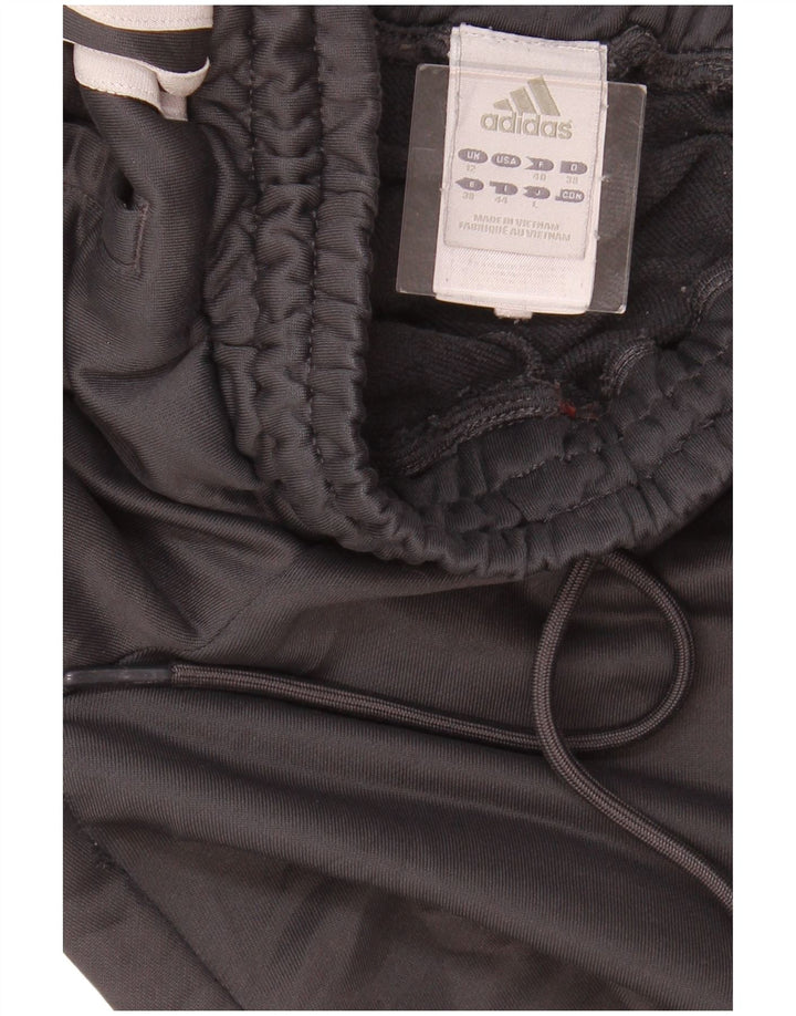 ADIDAS Ženske hlače za trenirku UK 12 Srednji crni poliester