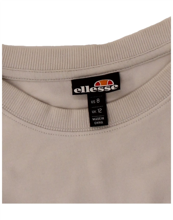 ELLESSE Womens Oversized Graphic Sweatshirt Jumper UK 12 Medium Off White Vintage Ellesse and Second-Hand Ellesse from Messina Hembry 