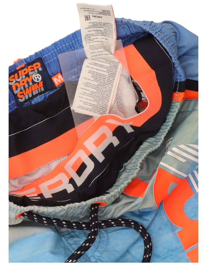 Superdry muške kratke hlače za plivanje s plavim prugama srednje veličine od poliestera