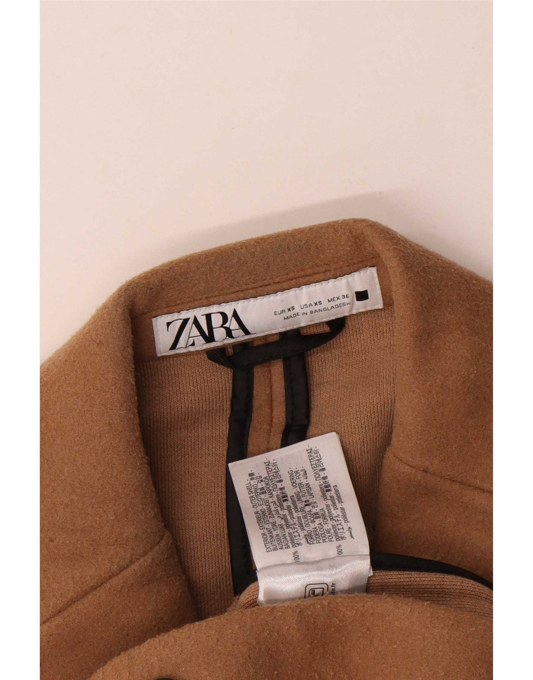 Preveliki muški kaput Zara UK 34 XS bež poliester