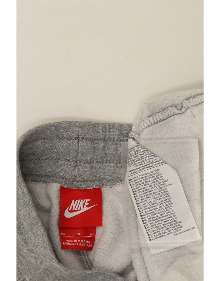 NIKE Ženske trenirke s grafičkim motivima Joggers UK 14 srednje sivi pamuk