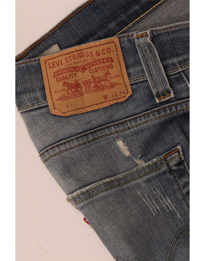 Levi's muške 511 uske traperice s oštećenjem W33 L34 plave