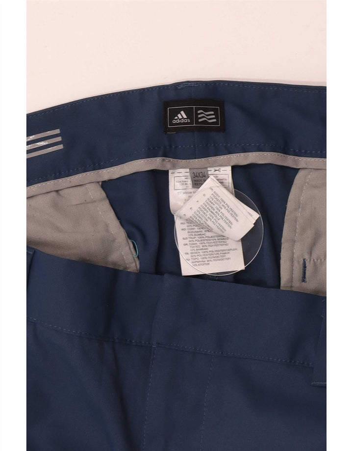 Adidas muške ravne chino hlače W34 L34 plavi poliester