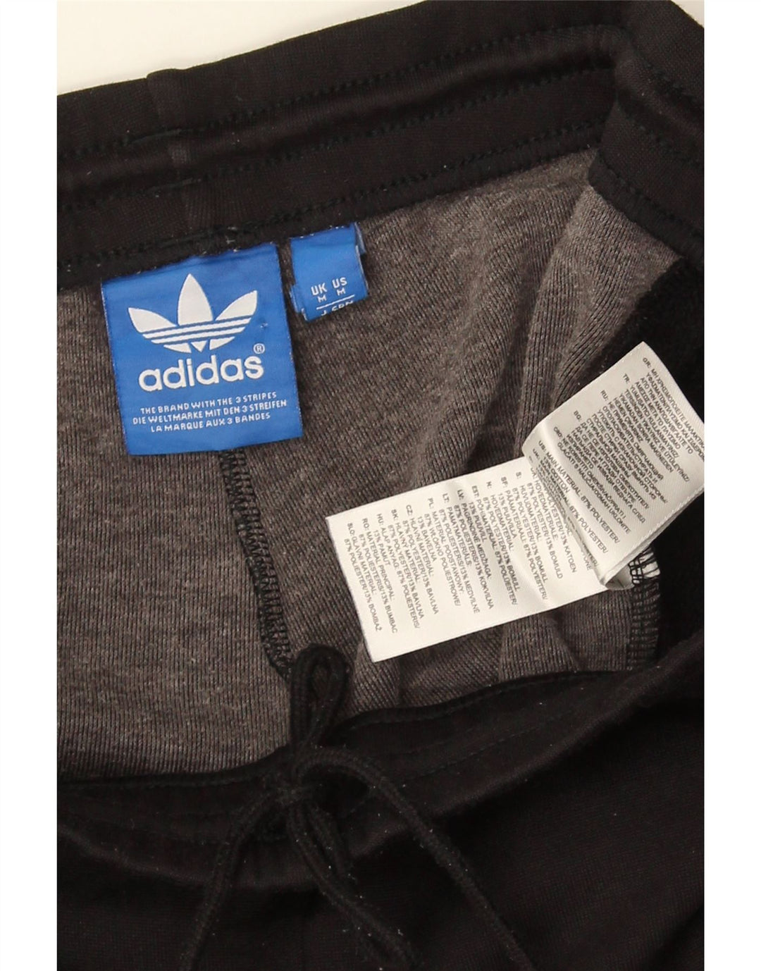 Adidas muške grafičke hlače za trenirku srednje crne boje od poliestera