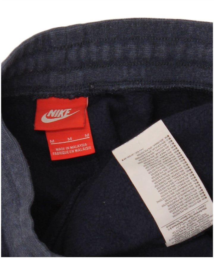 Nike muške trenirke Hlače Joggers srednje tamnoplavi pamuk